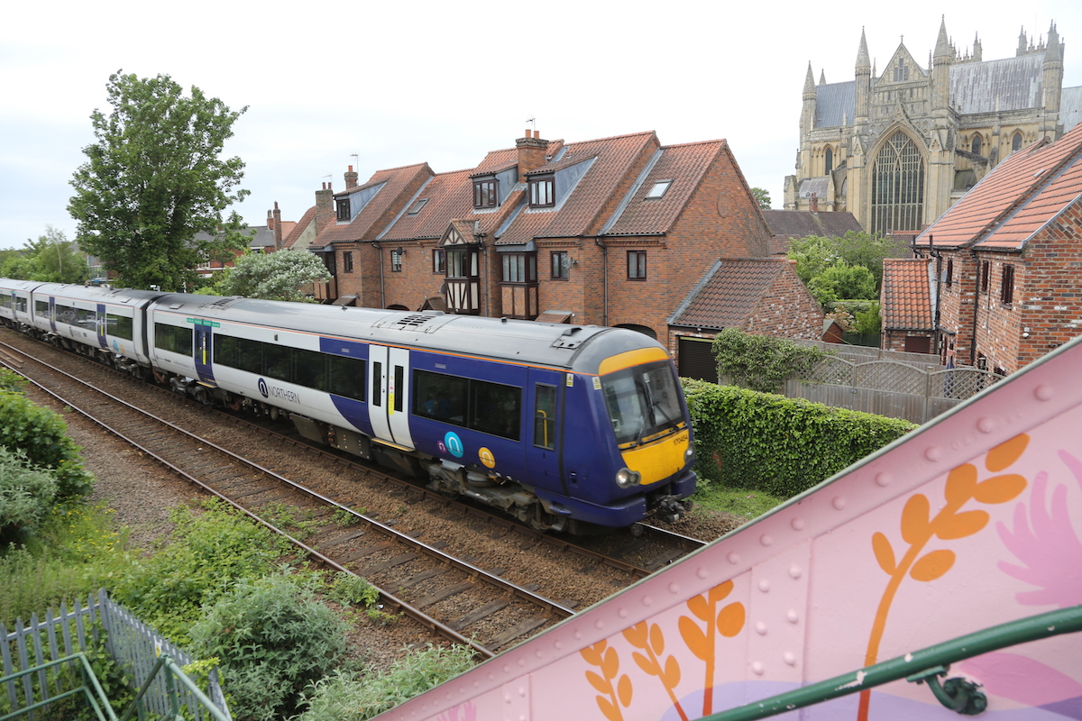 Northern 170 passing Beverley Minster
Ex Scotrail unit, providing a very comfortable service across Yorkshire

THe 24mm lens is not quite wider enough too get a whole 3-car train into the picture
