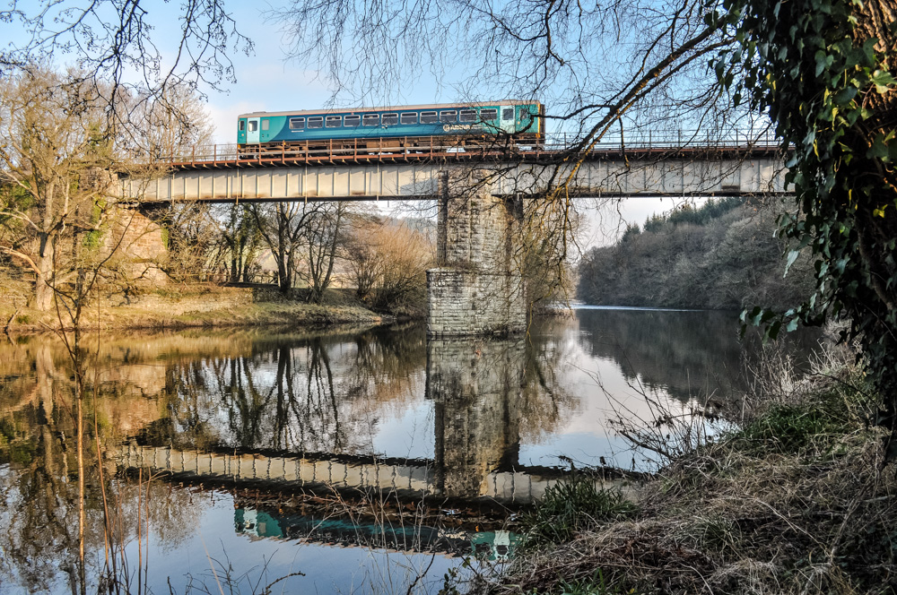 The Beautiful Wye
A class 153 crosses the bridge at Rhosferig, heading for Builth Road on its journey north to Shrewsbury, on The Central Wales Line.
