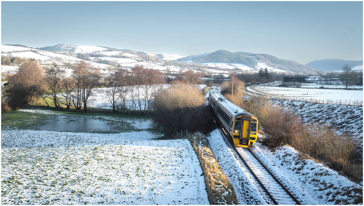 Cambrian Snow
This was the scene high up in the Cambrian mountains as a pair of TfW Sprinters, led by 158838 made their approach towards Talerddig between Newtown and Machynlleth with services for Aberystwyth and Pwllheli, Saturday 10.1.26
