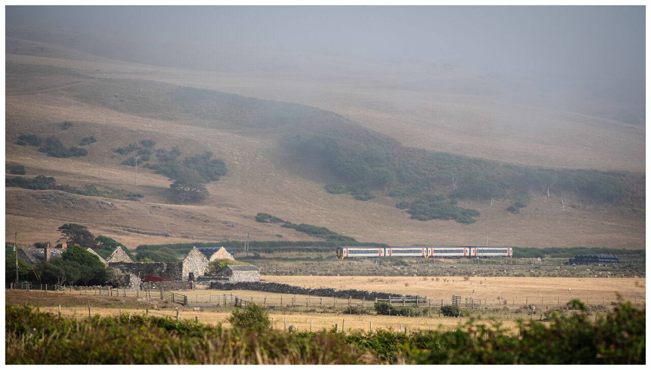 Sprinters and Sea Fret
A sea fret rolled in just before capturing the scene here at Tywyn, around a mile from the coast. 158840 with 158825 on the rear working 2I28, the 15.37 Pwllheli to Machynlleth passing Vaenol Caravan Park, south of Tywyn, West Walesw on @The Cambrian Line Thursday 13.8.26
