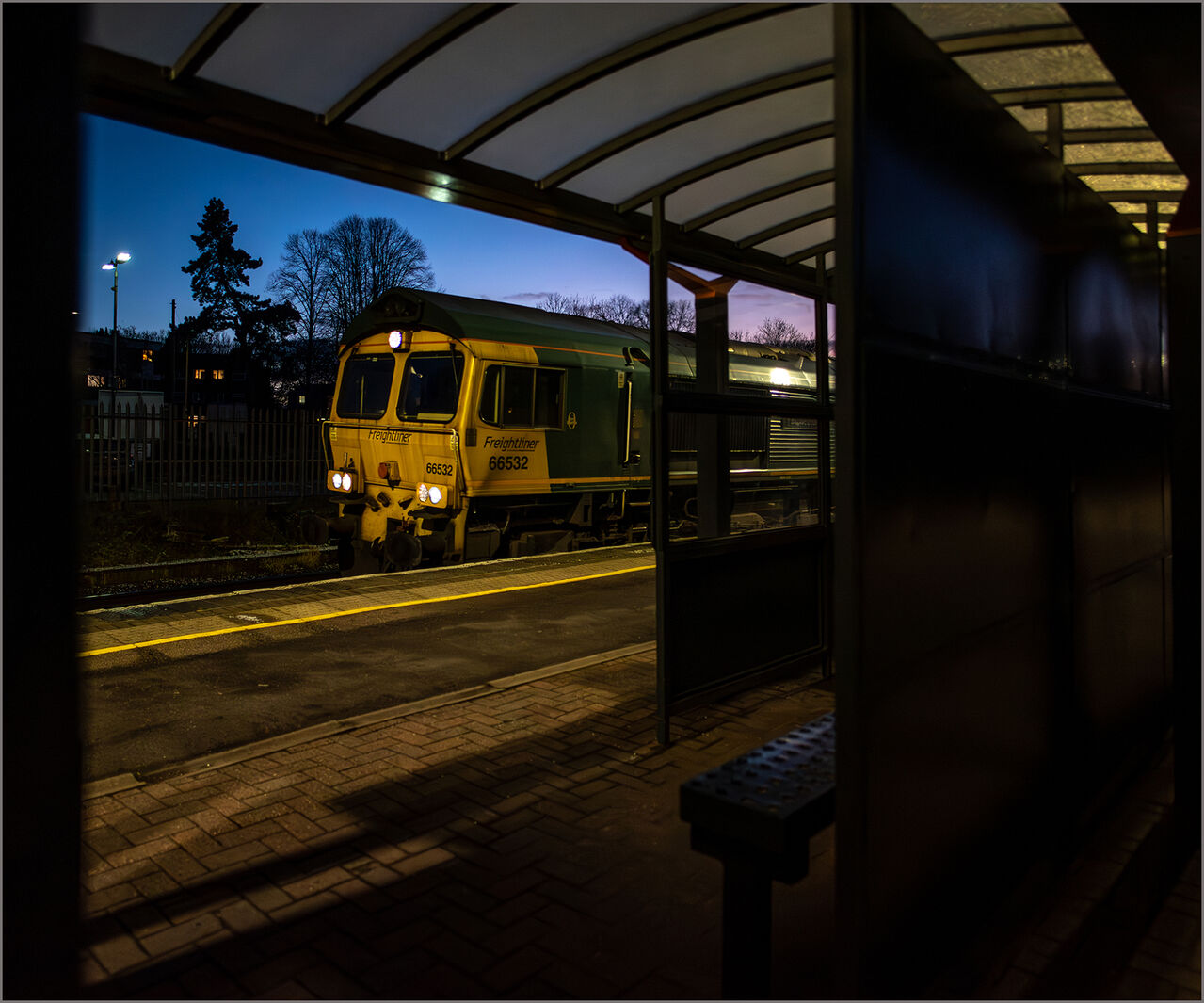 Blue Hour Sged
We've not long entered the blue hour when 66532 presented itself at Water Orton  heading 4O17 the 16:05 Lawley Street to Southampton Marine.
