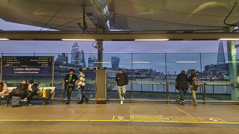 Waiting time 
On a passing Thameslink service a shot out of the window over the River Thames on the down platform of Blackfriars - A hand held shot with the lens hard against the train window to reduce reflections and to steady the phone at 1/15 of a second.
Keywords: Blackfriars;London;People;Thameslink;Thames;Window