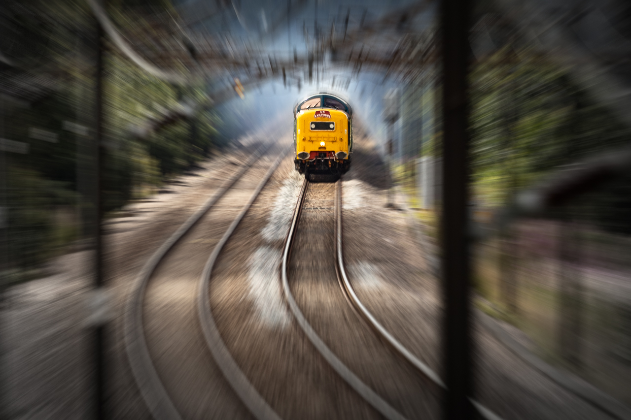 Azooma Deltic
55009, running as 55013 'The Black Watch', approaching Ryther along the Selby Diversion. Looking and sounding fantastic under the customary blue haze. Working 1Z55 the 'Coronation Deltic', a UK Railtours charter from Kings Cross to Scarborough. Photoshop effect added



