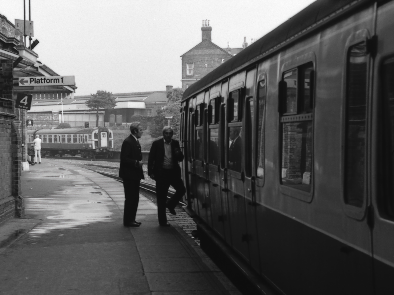 Bournemouth comings and goings
The front 4TC on a down fast from Waterloo is arriving at Bournemouth's platform 3 while the 4VEP in platform 2 will leave shortly on an up slow. The latter would normally leave from the bay platform, No. 1. That it is not and that there are two drivers on the platform indicates that it has come around from Bournemouth West carriage sidings.
Keywords: Bournemouth;4VEP;Bournemouth West
