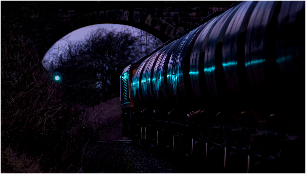 Going Away
66792 is seen cresting Houghton bank summit with the  6V84 0743 Clitheroe Cement to Avonmouth. It was a freezing cold morning and i was en route to the S&C with fellow 1Z10er Nigel Capelle who kindly took me to this location for the 1st shot of the day. The lighting was very poor but i managed this unexpected bonus....ain't it always the way.
To quote John Lennons trains potting cousin Matt Lennon. "Railway Photography is what happens whilst you're busy planning the perfect shot"
Keywords: Class 66, Railway Photography, Creative,light,