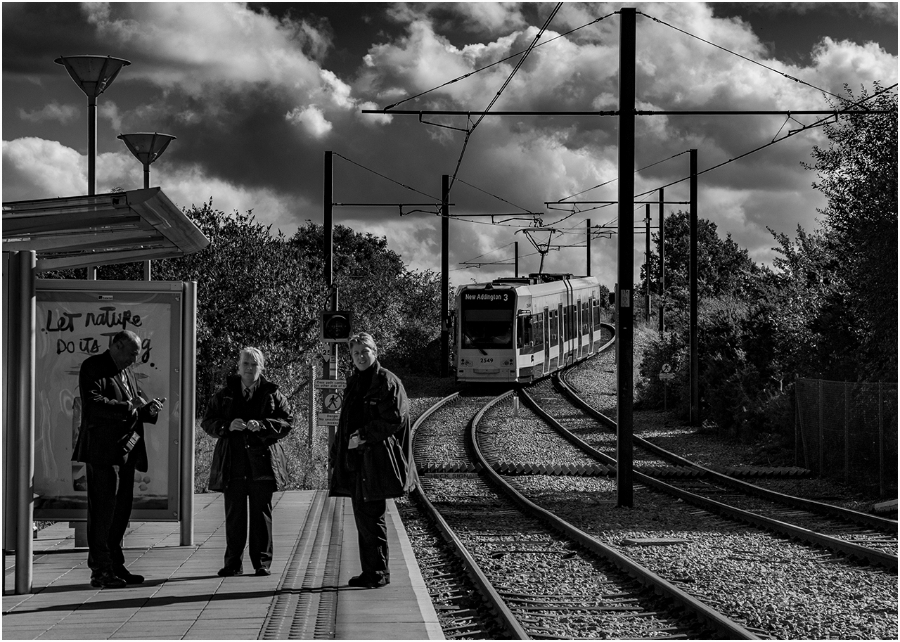 All Tickets And Passes Please!
Revenue inspectors at Mitcham Junction as a Tram works Wimbledon to New Addington
