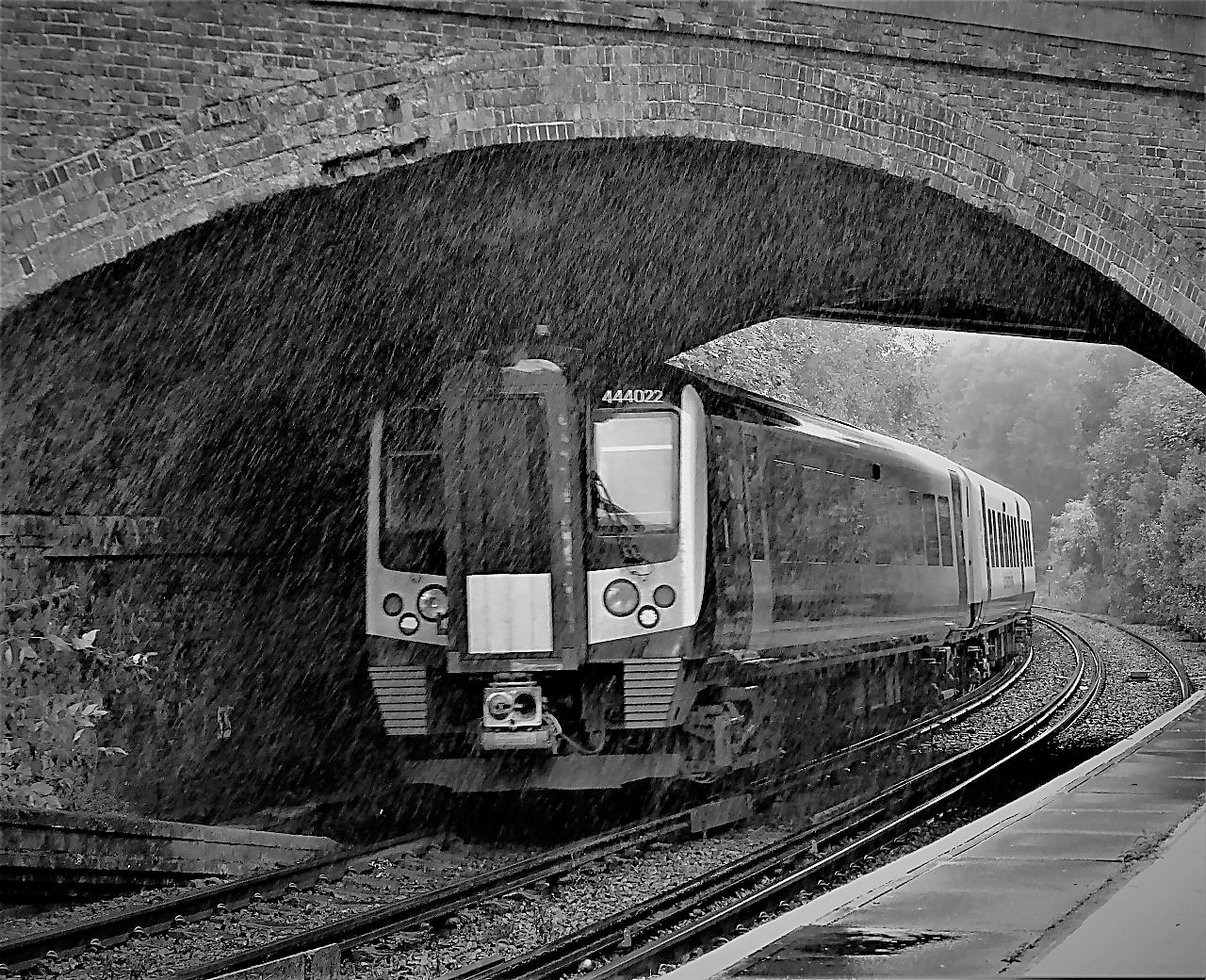 British Summertime
In a typical summer downpour, 444022 departs Branksome on 1W21 1030 Waterloo - Weymouth. Hope any holidaymakers enjoy their time on the beach at Poole or Weymouth.
