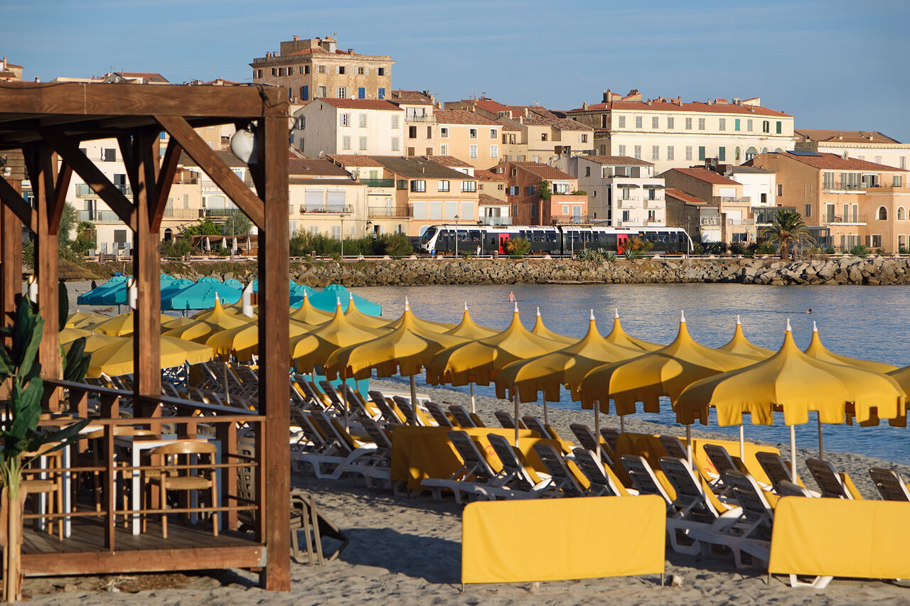 Morning train to Bastia
Corsican metre-gauge: The AMG unit forming the morning Calvi-Bastia service runs between town and beach at L'Ile Rousse, the last coastal stop before the line turns inland into the mountainous interior.
